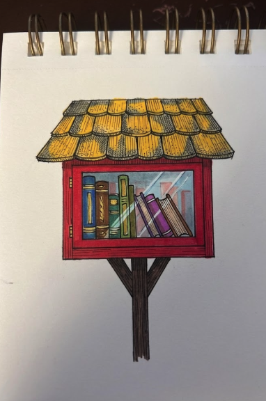 A small roadside book library in Mountain View with a yellow roof and red frame.